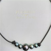 Les Australes leather necklace with five Tahitian pearls